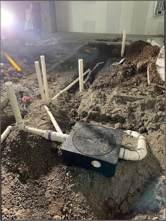 Commercial grease trap fitting installed by Duncan Family Plumbing, the kind of work businesses along the Oxford Valley corridor need